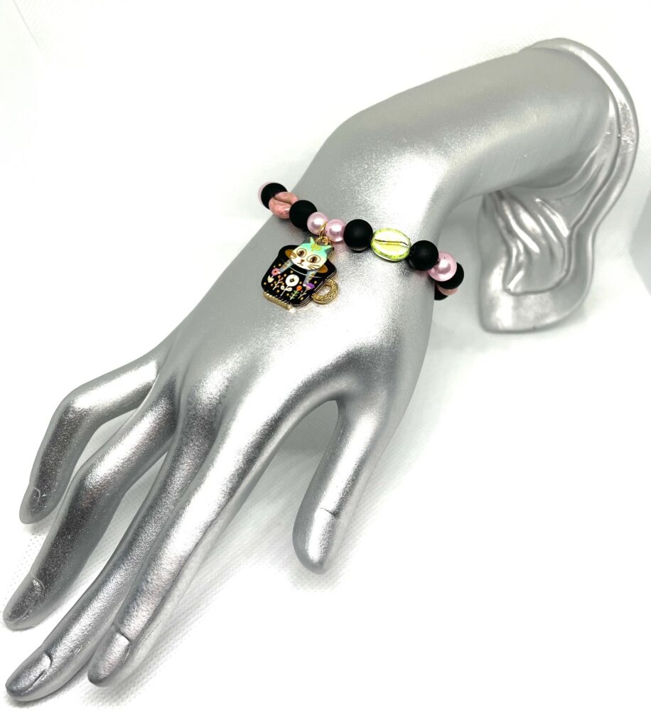 Jewelry under $20 Coffee Kitty bracelet with a kittens in coffee cup charm with pink and green coffee bean beads and blackout beads for sale.